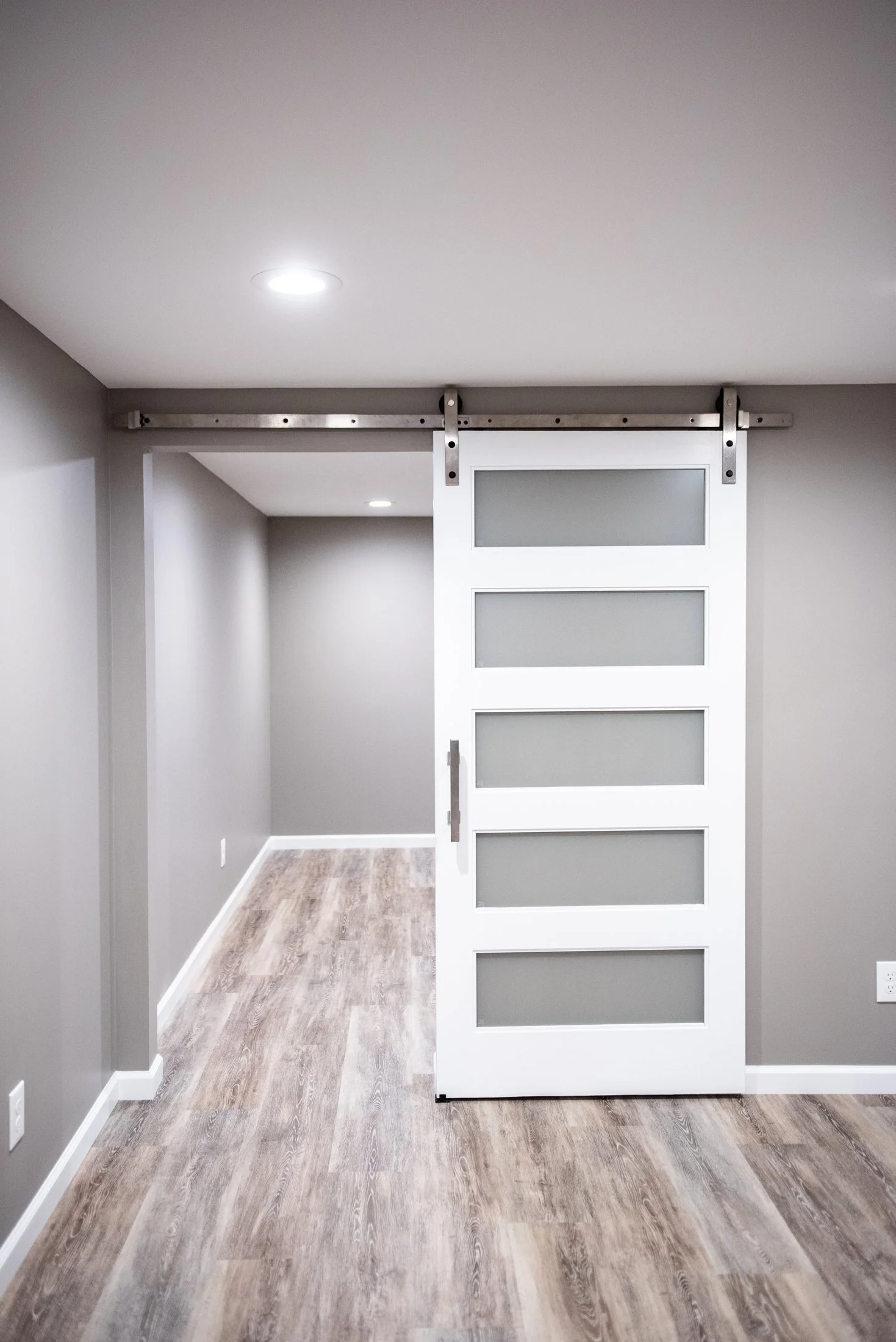 Barn-style door in a finished basement