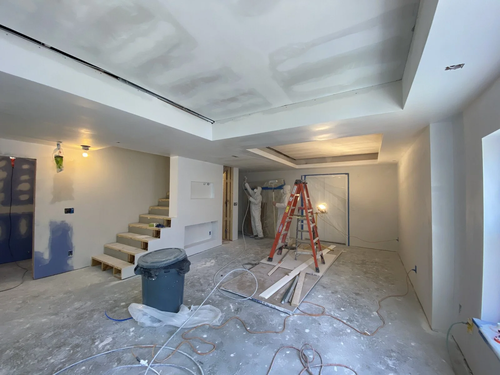 During: drywall and the tray ceilings in place