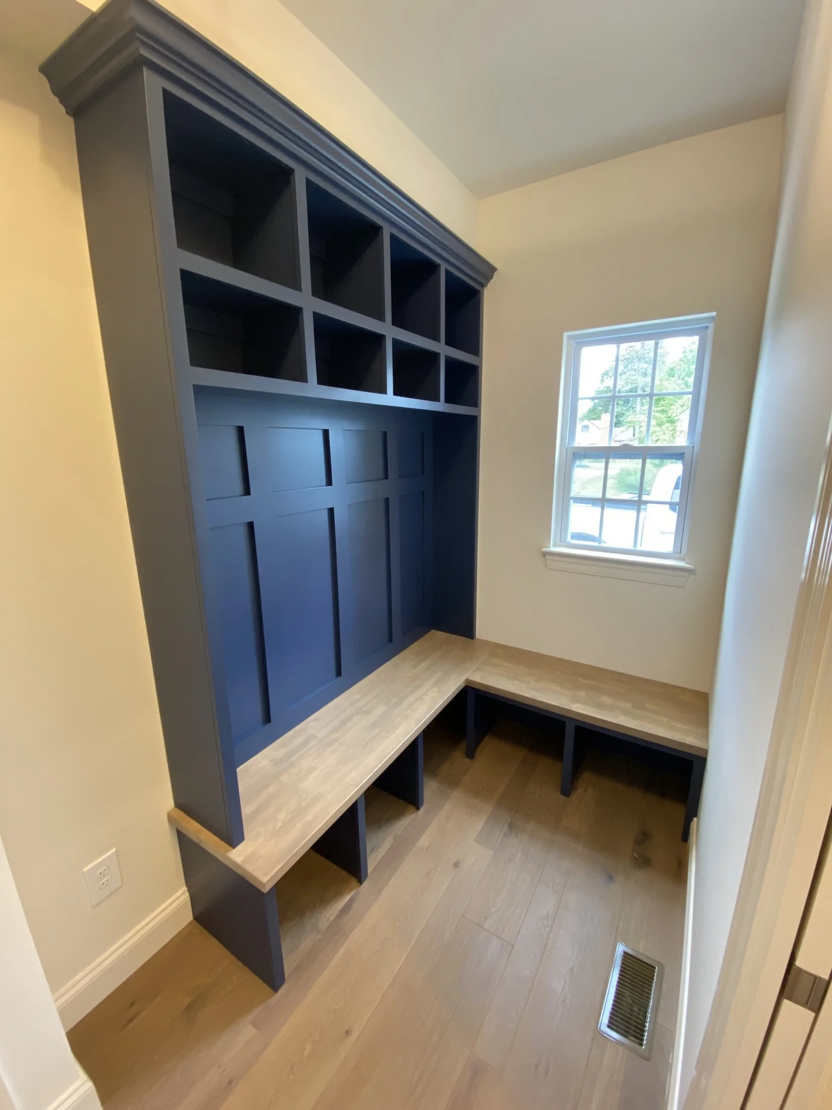 Mudroom bench with shoe storage below