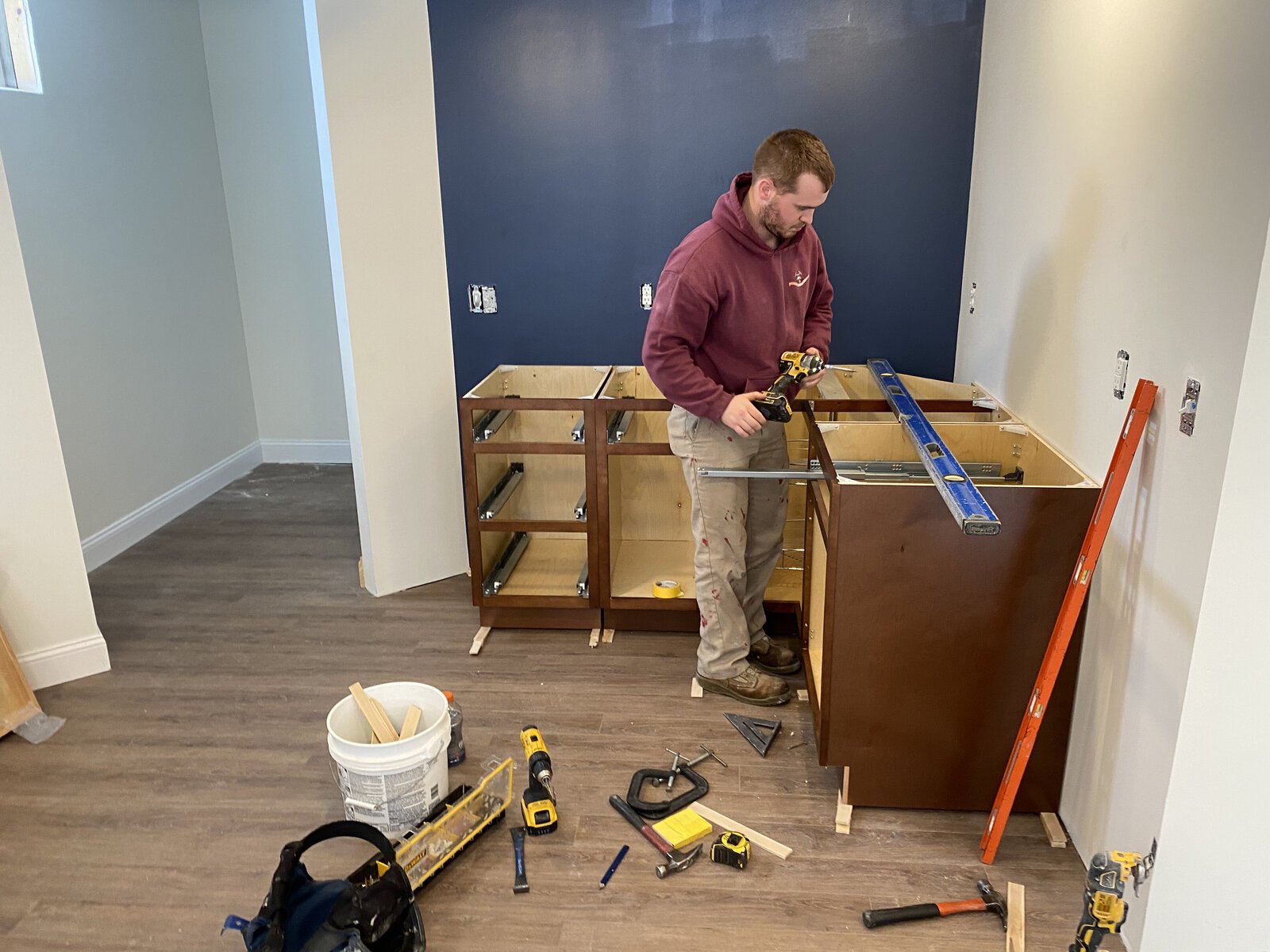 During: wet bar cabinets going in