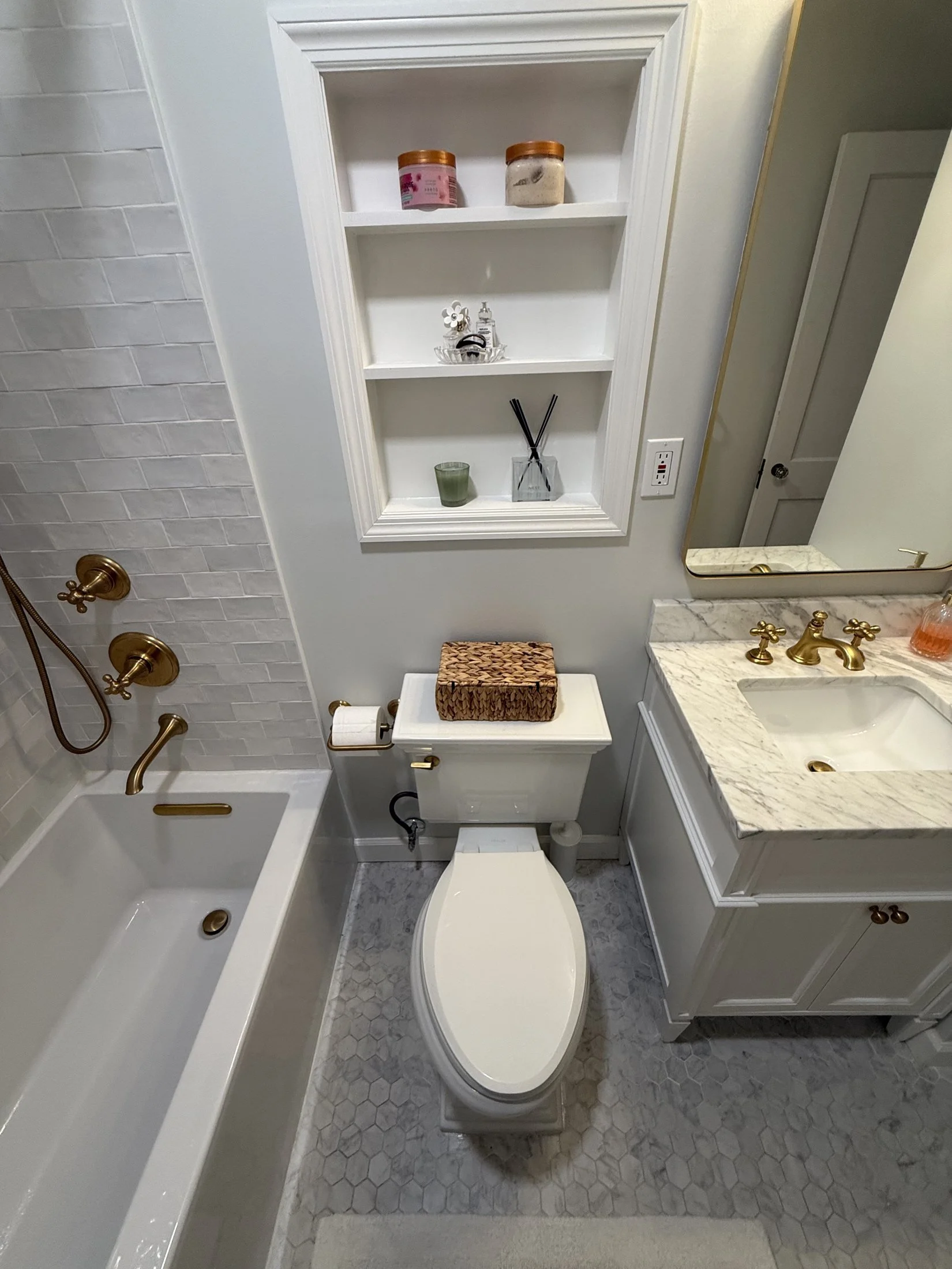 Recessed shelf above the toilet