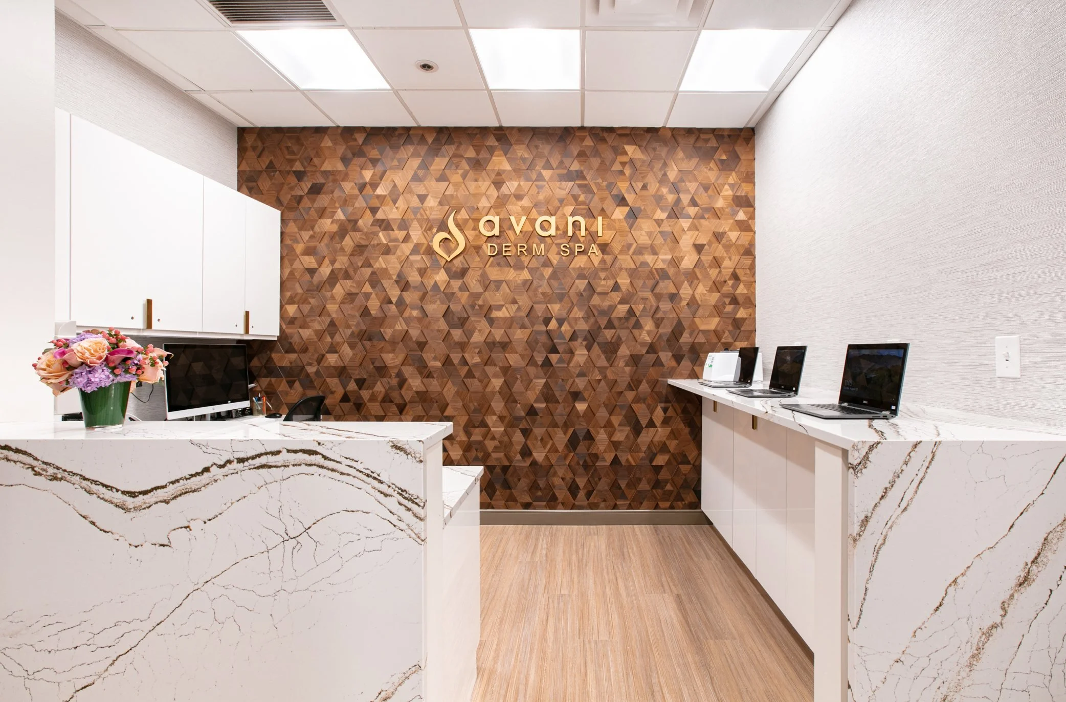 Reception desk with quartz waterfall edges