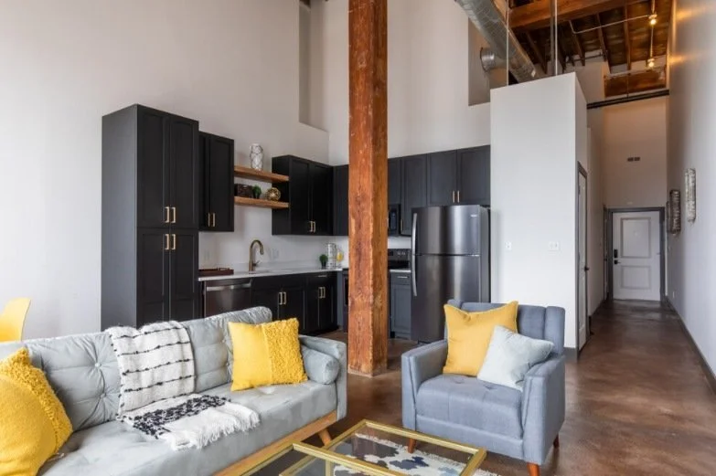 Loft living room with tall windows