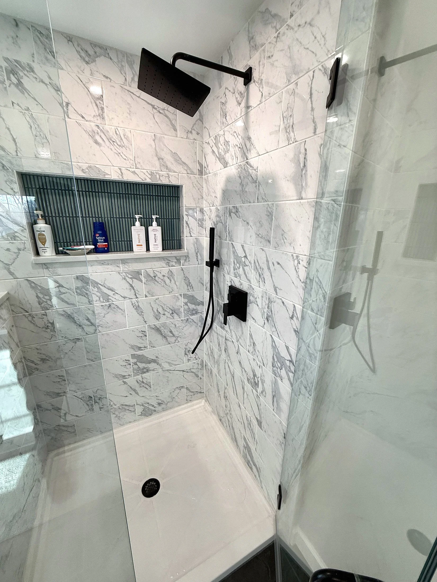 Shower niche with matte black fixtures