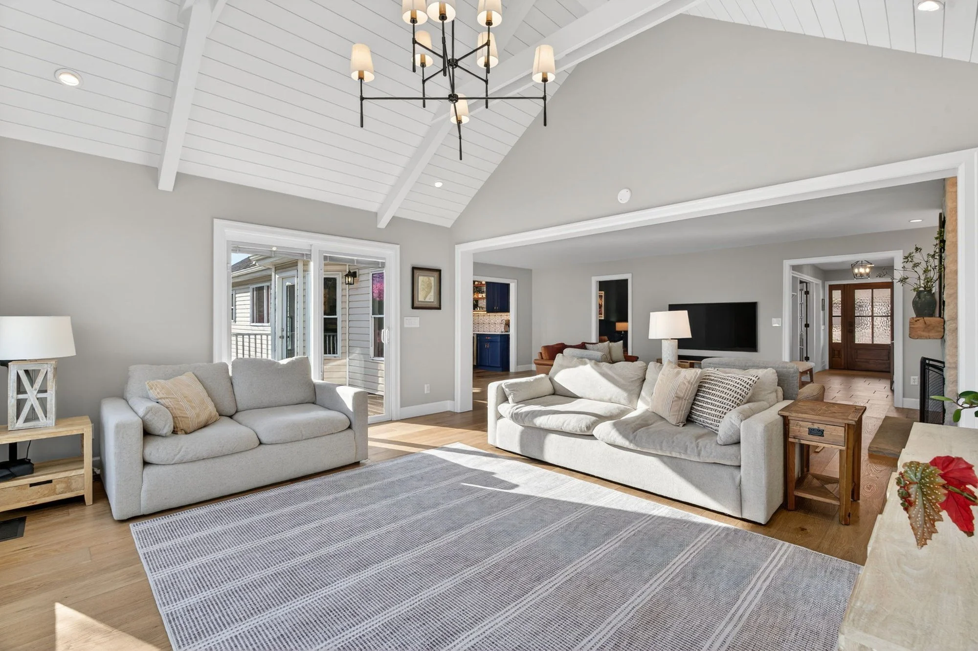 Great room seating under exposed ceiling beams