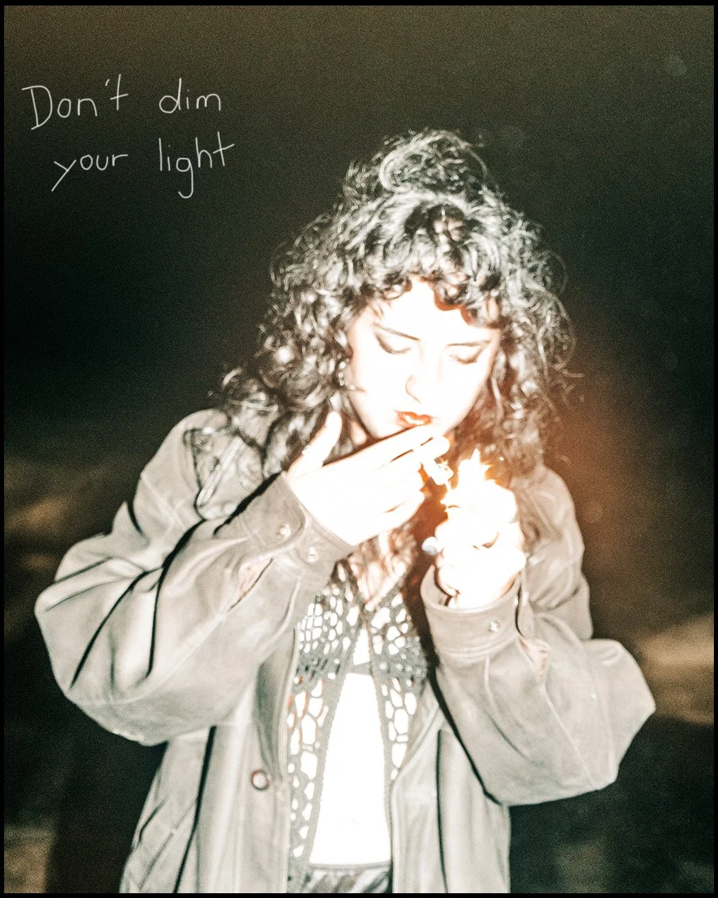 moody portrait lighting a cigarette with handwritten text overlay, raw cinematic editorial photography