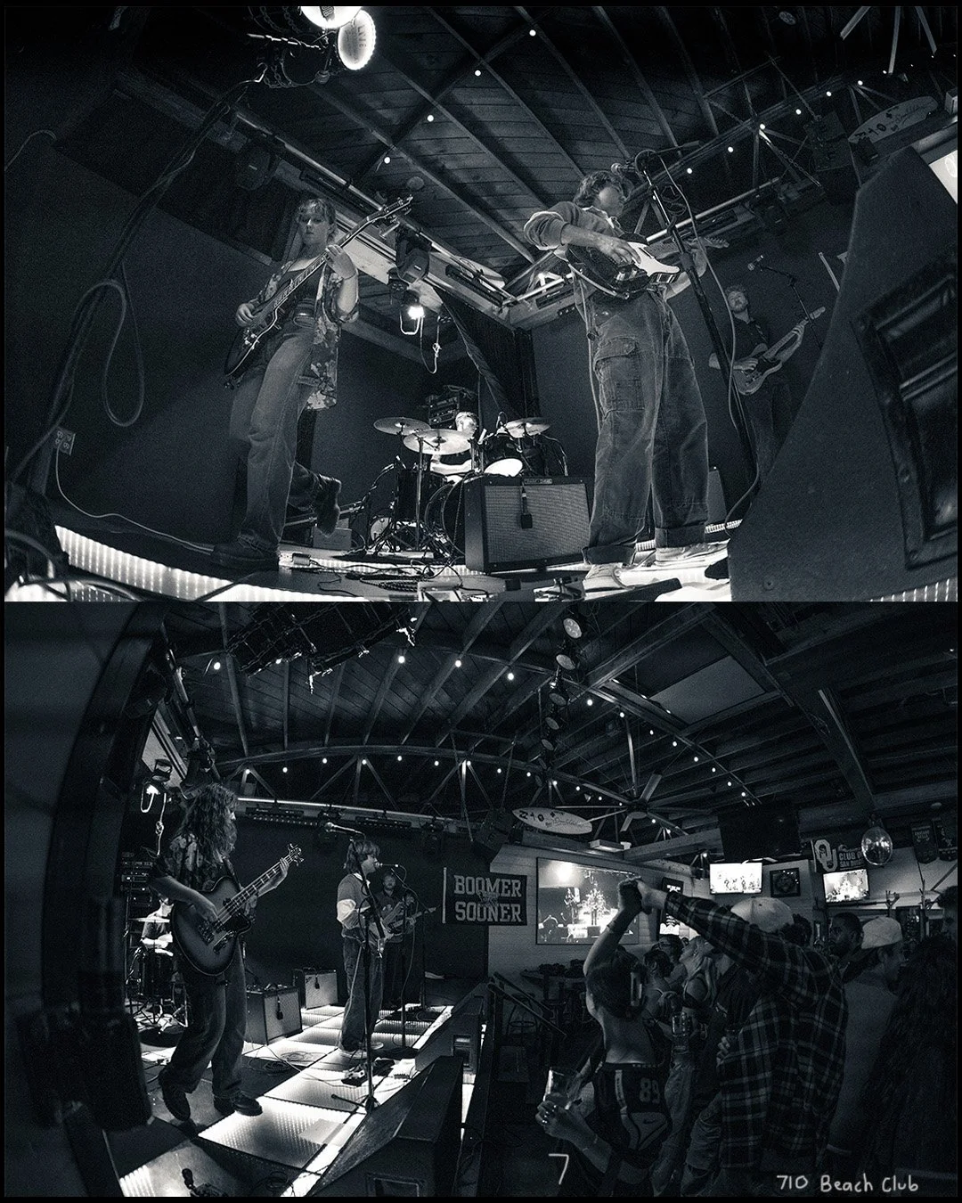 live band performing on stage, black and white concert photography with a wide angle perspective