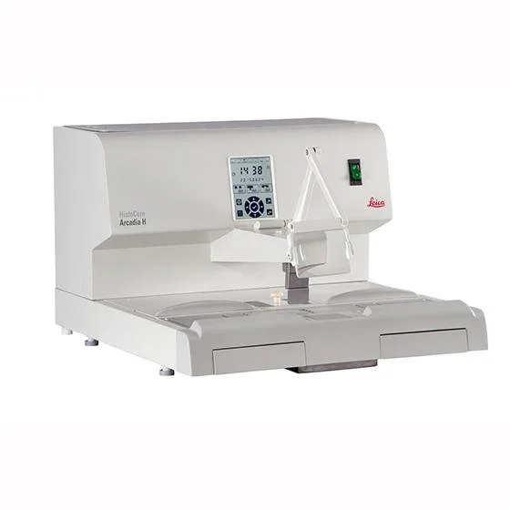Medical laboratory instrument used for automated hematology testing, with a digital display and control panel.