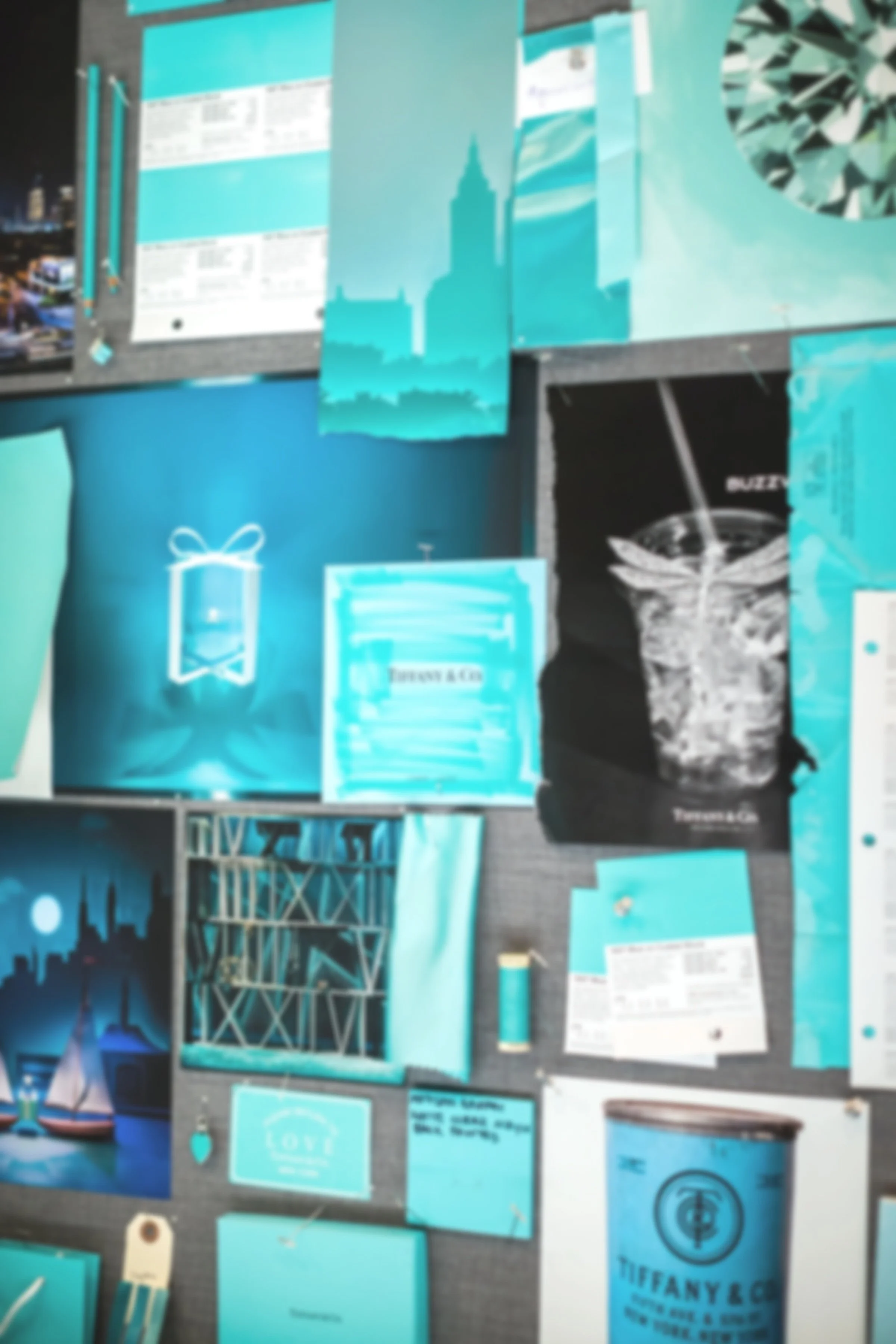 A collage of Tiffany & Co. promotional materials, including posters and advertisements featuring their signature blue color and branding.