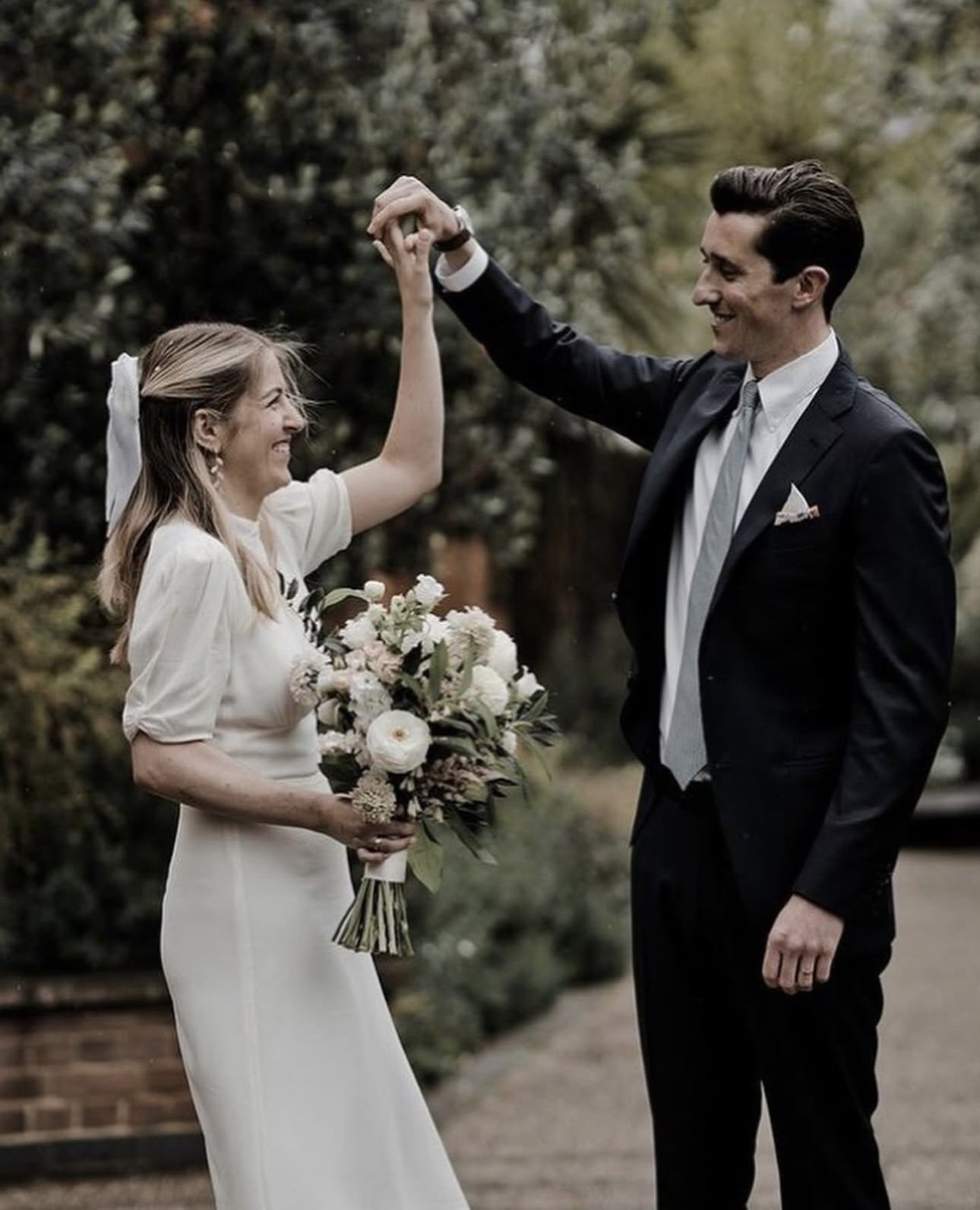 Intimate civil ceremony wedding flowers in London and Sussex, showcasing a refined bridal bouquet and simple, seasonal floral arrangements perfect for small weddings and registry office celebrations.
