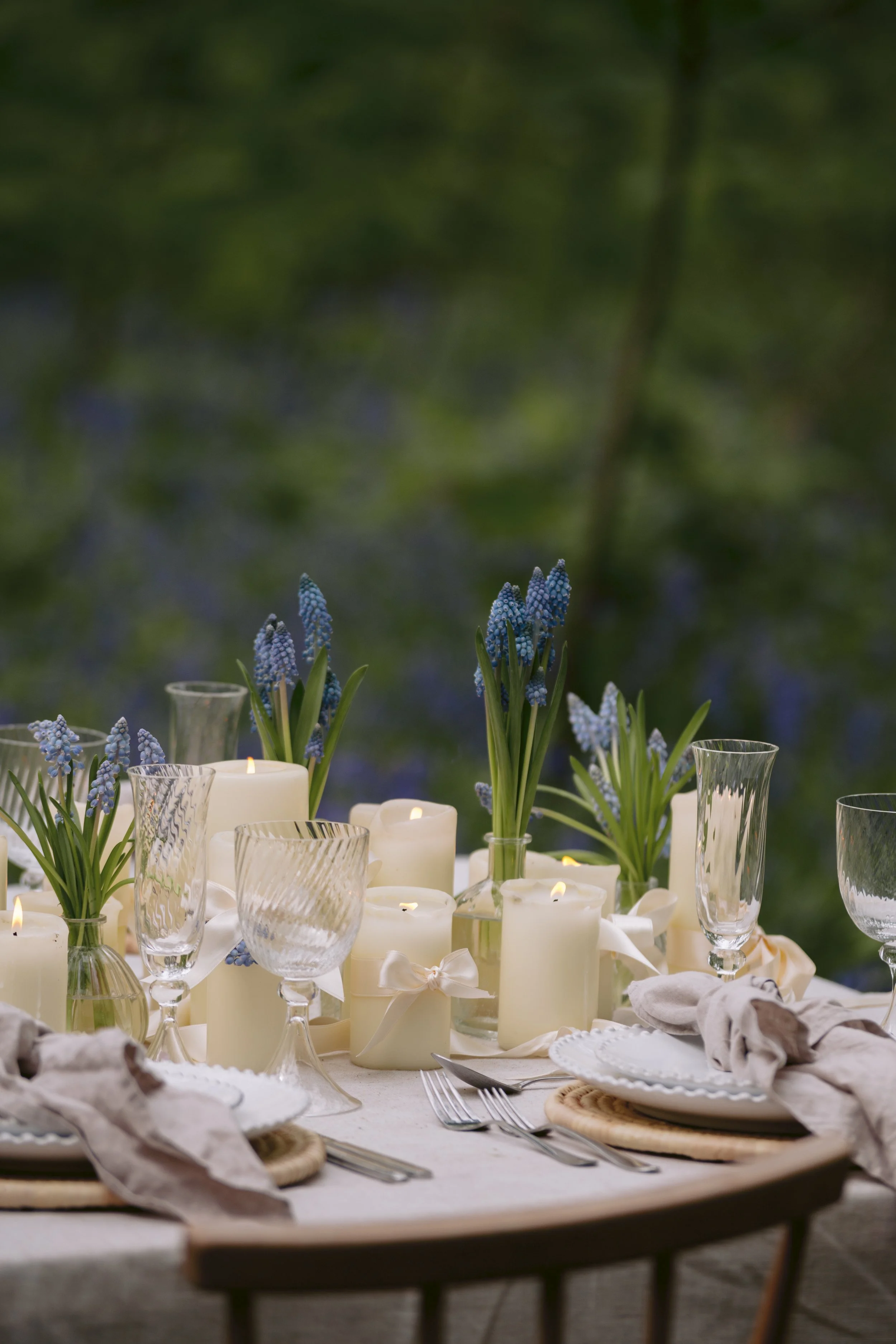 Wedding floristry in London and West Sussex, showcasing ceremony arrangements and table flowers designed to complement modern venues.