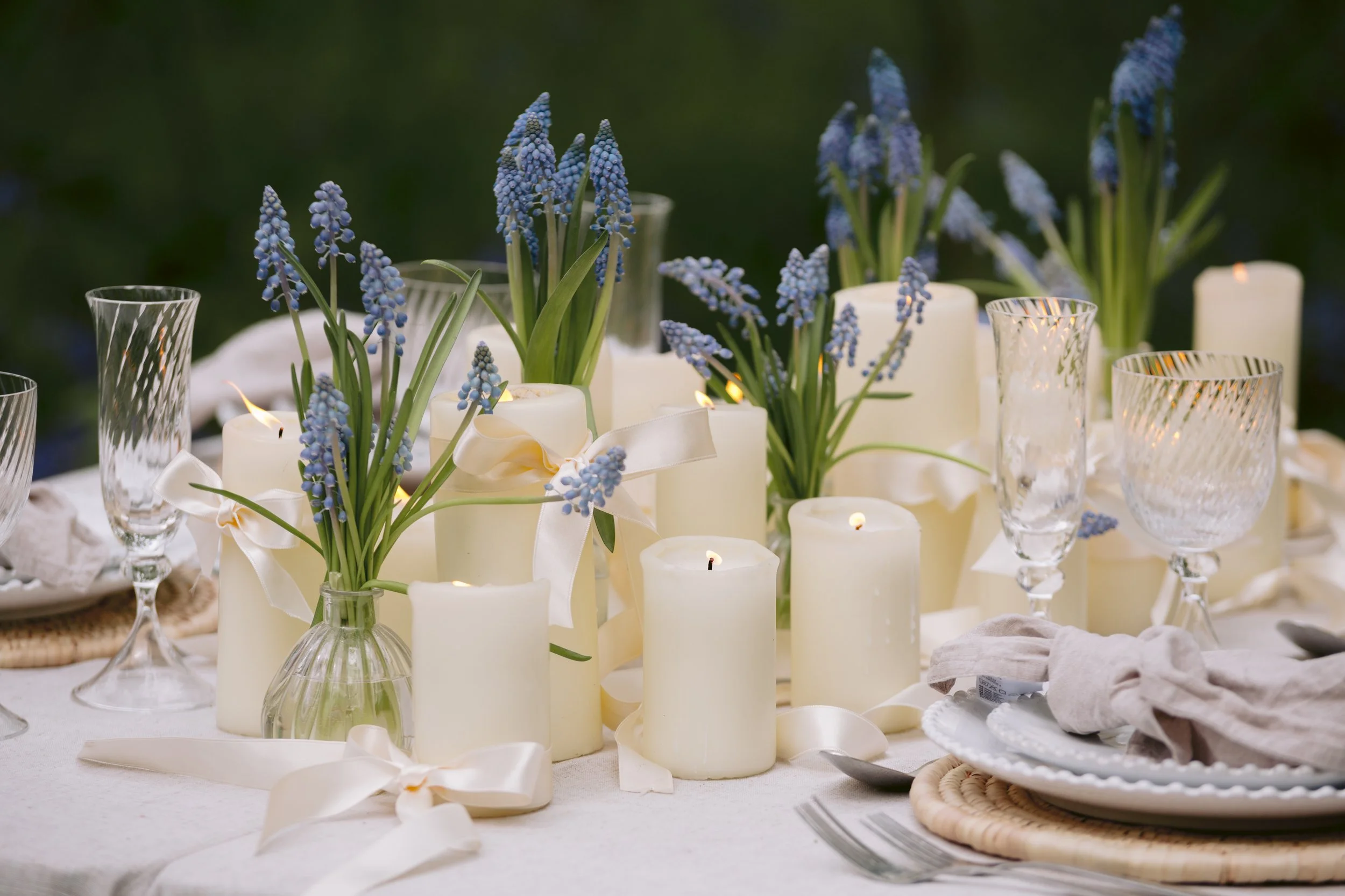 Wedding floristry in London and West Sussex, showcasing ceremony arrangements and table flowers designed to complement modern venues.