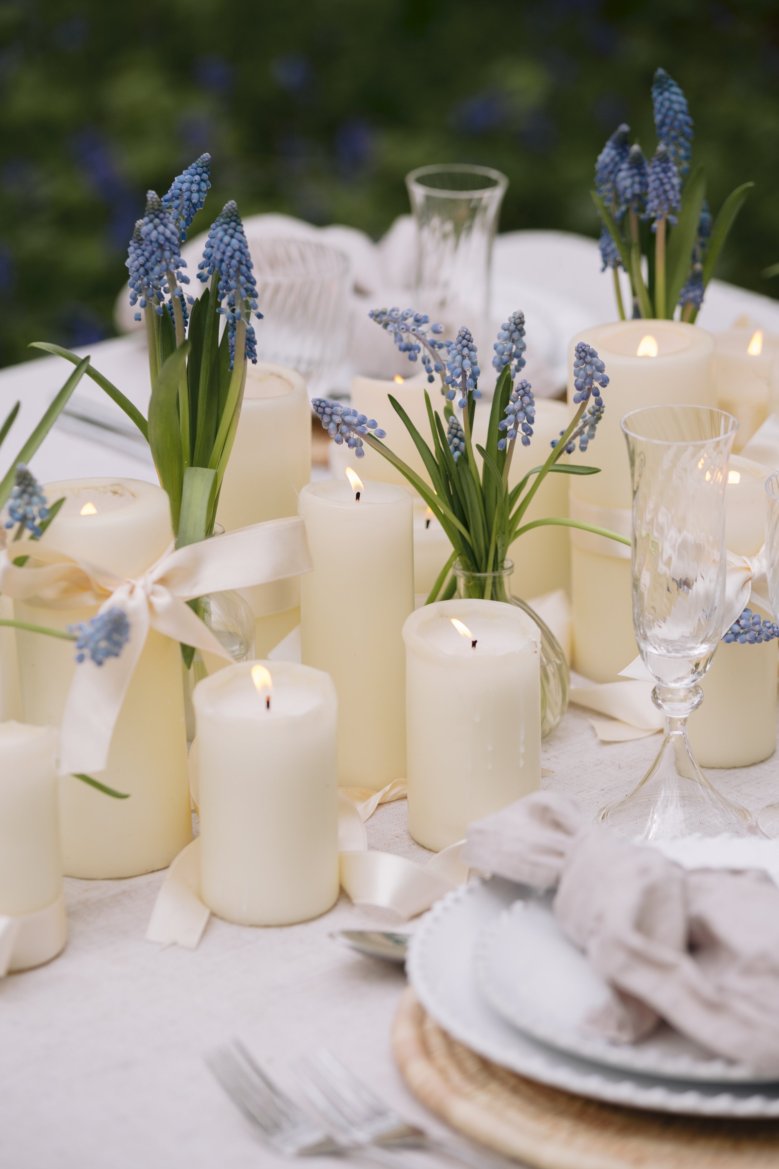 Wedding floristry in London and West Sussex, showcasing ceremony arrangements and table flowers designed to complement modern venues.