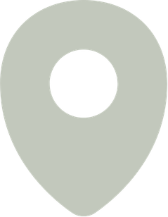 A gray map location pin icon with a black center.