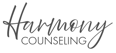 Harmony Counseling logo in elegant gray cursive typography, representing online therapy services.