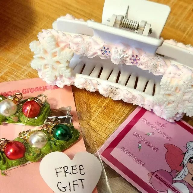 pastel pink hair claw with a set of ornament charm hair clips