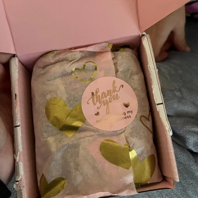 a pink packaged box