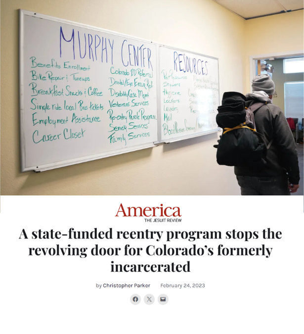 Whiteboard on a yellow wall with handwritten notes about the Murray Center and available resources. Two people wearing backpacks and winter clothing stand nearby. The notes include benefits like employment assistance and career counseling, and resources like food and housing support.