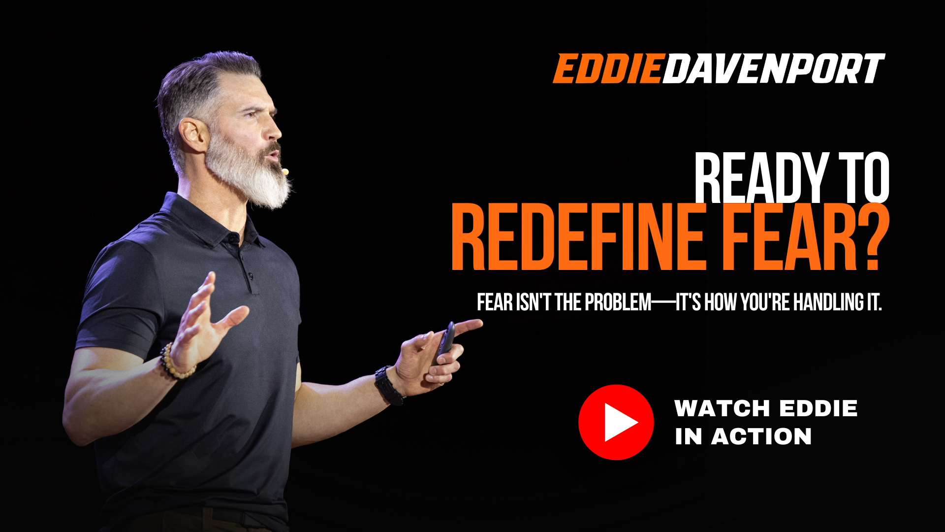Eddie Davenport speaking on stage with a black background, gesturing with his hand, promoting a message about redefining fear and encouraging viewers to watch him in action.