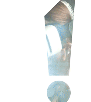 A person taking a selfie in a mirror with a smartphone, partially obscured by a large exclamation mark graphic.