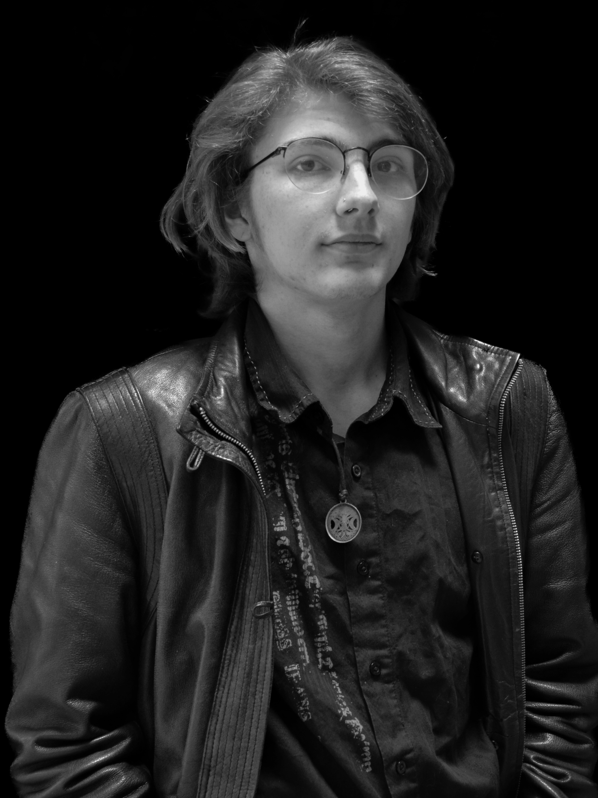 A black and white image of actor Skye Brown-Black from the shoulders up