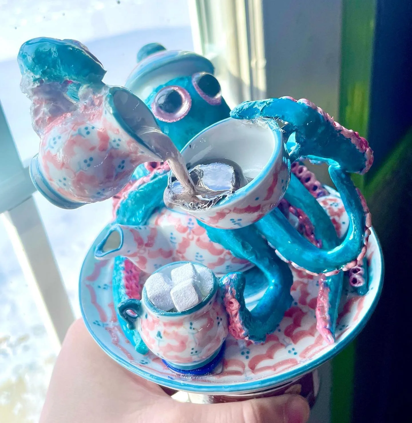I hyperfocused on this art piece for a few days 😅 I saw the tiny tea set at a flea market and knew immediately what I wanted to use it for!  #art #ceramics #sculpeyclay #artistsoninstagram #tea #teaset #octopus #sculpture #sculptureart #coffee #past