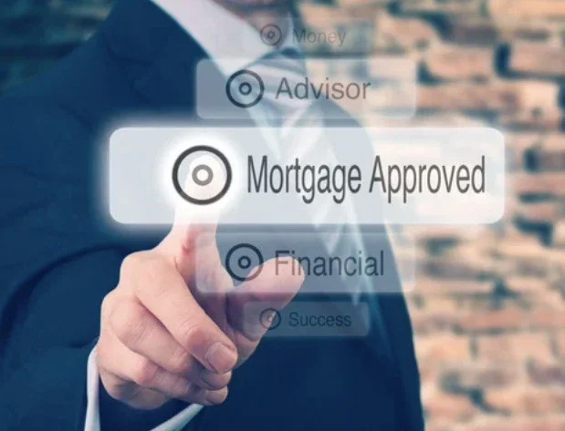Digital interface showing approval status for mortgage, with a person in business attire pointing at "Mortgage Approved"