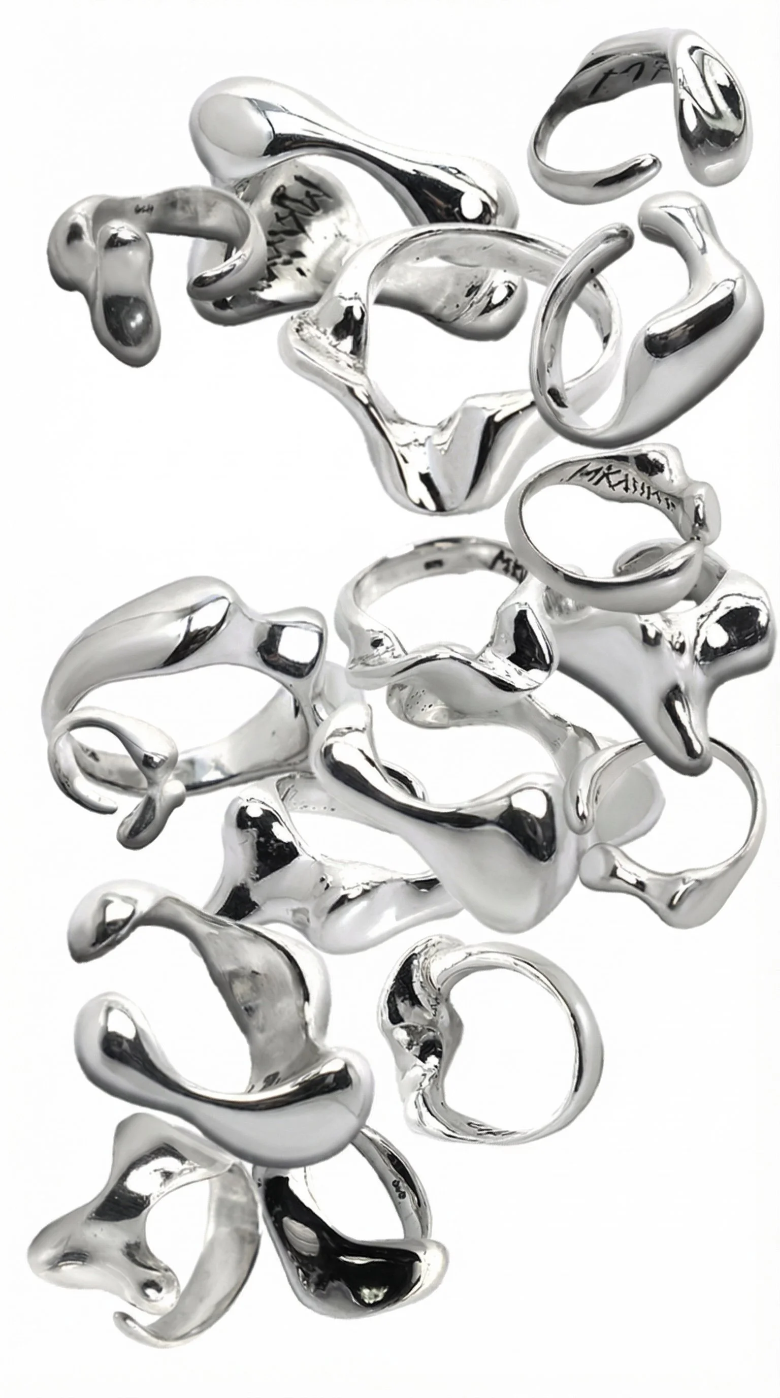 Collection of shiny silver rings with irregular, abstract shapes layered together against a white background.