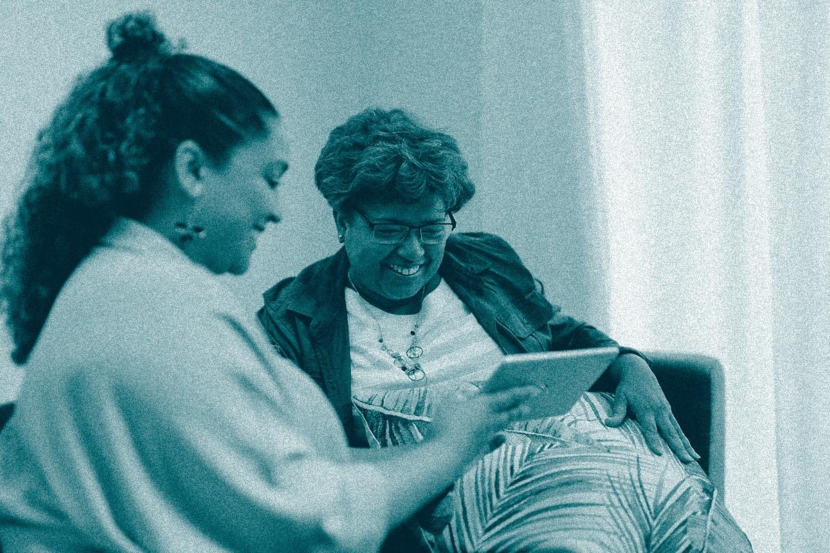 young woman providing in home support for adult woman