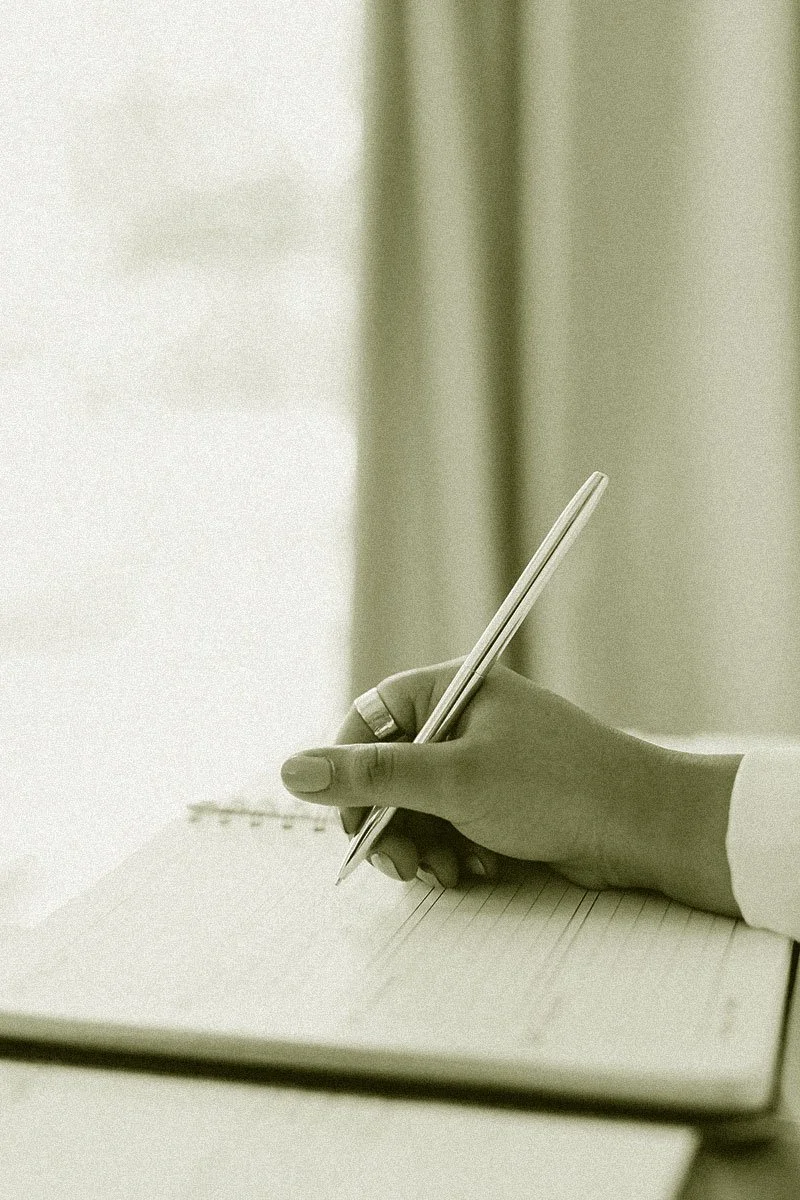 hand writing in notebook