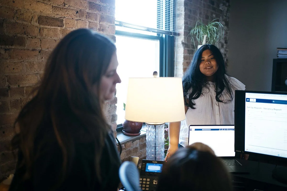 Keystone shared financial services for nonprofits team talking in office