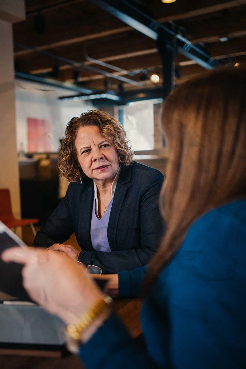 nonprofit strategic consultant talking to client