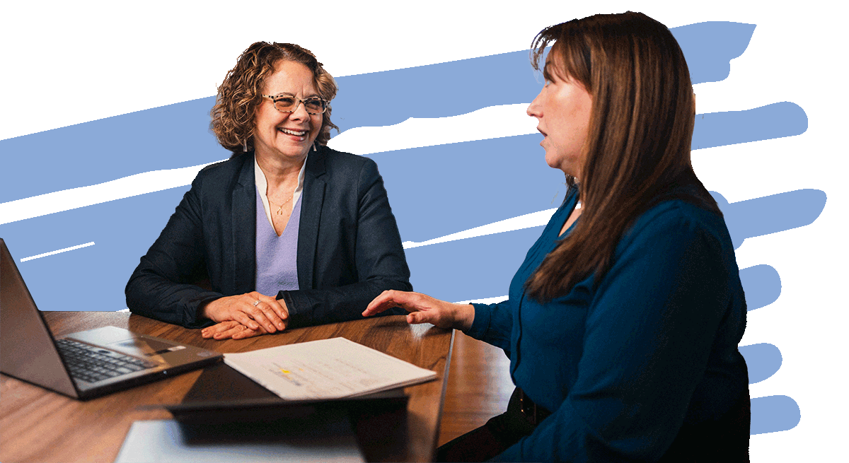 nonprofit strategic consultant talking with nonprofit leader