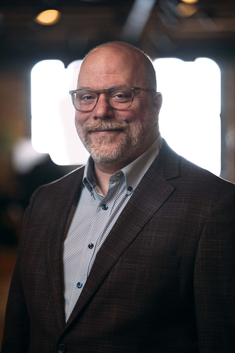 professional headshot of Greg Petersen