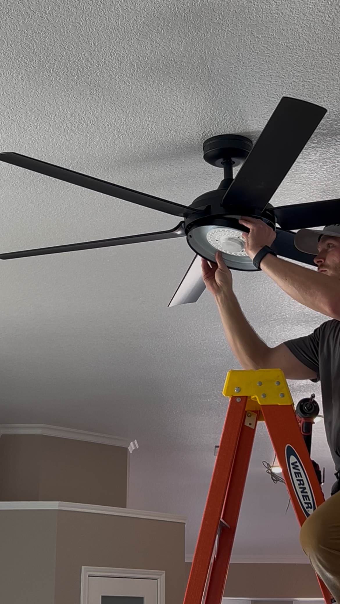 Moran Electric- Electrician installing ceiling fan in McKinney Texas
