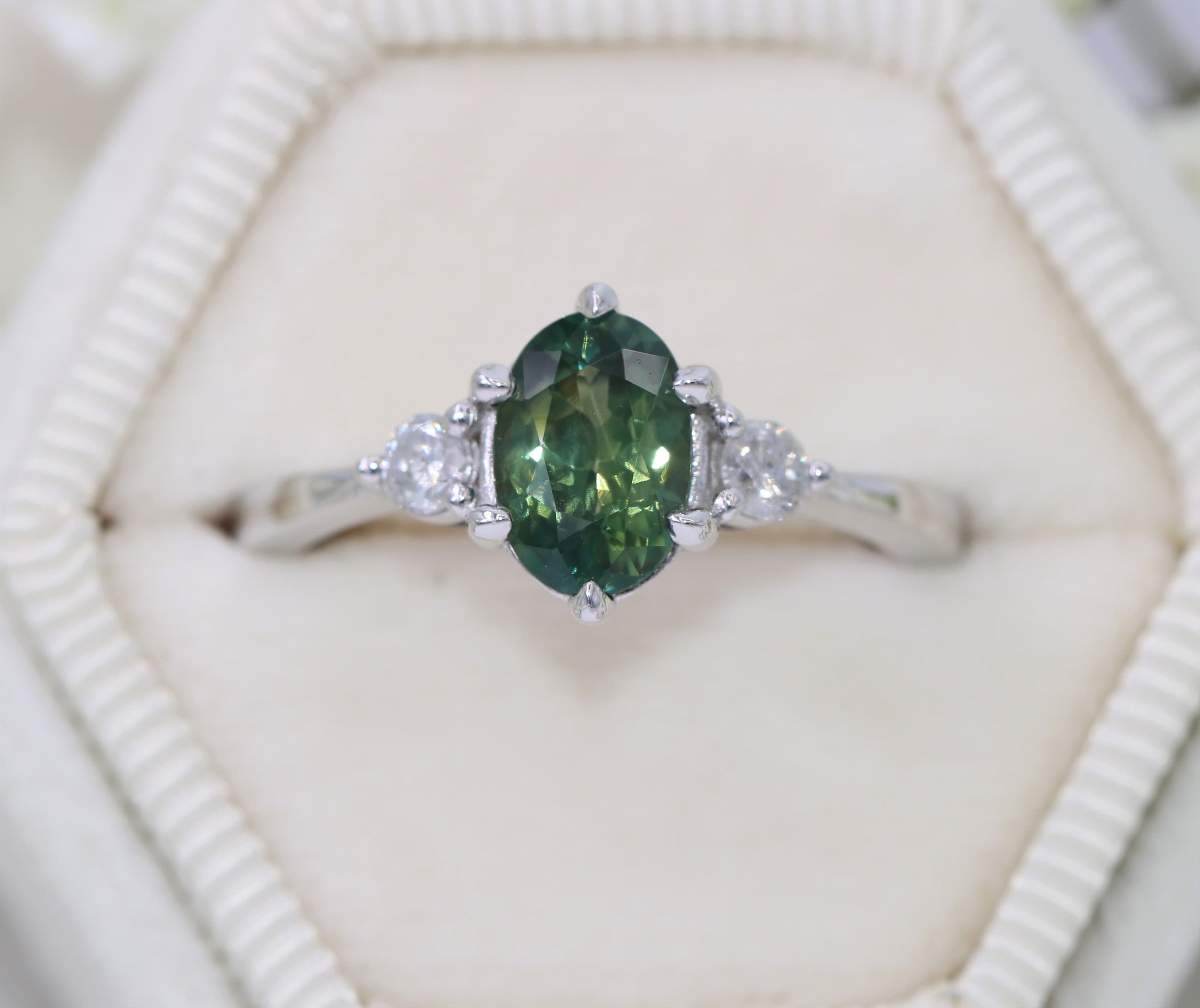 1.35 carat Oval Green Natural Sapphire Three Stone Ring