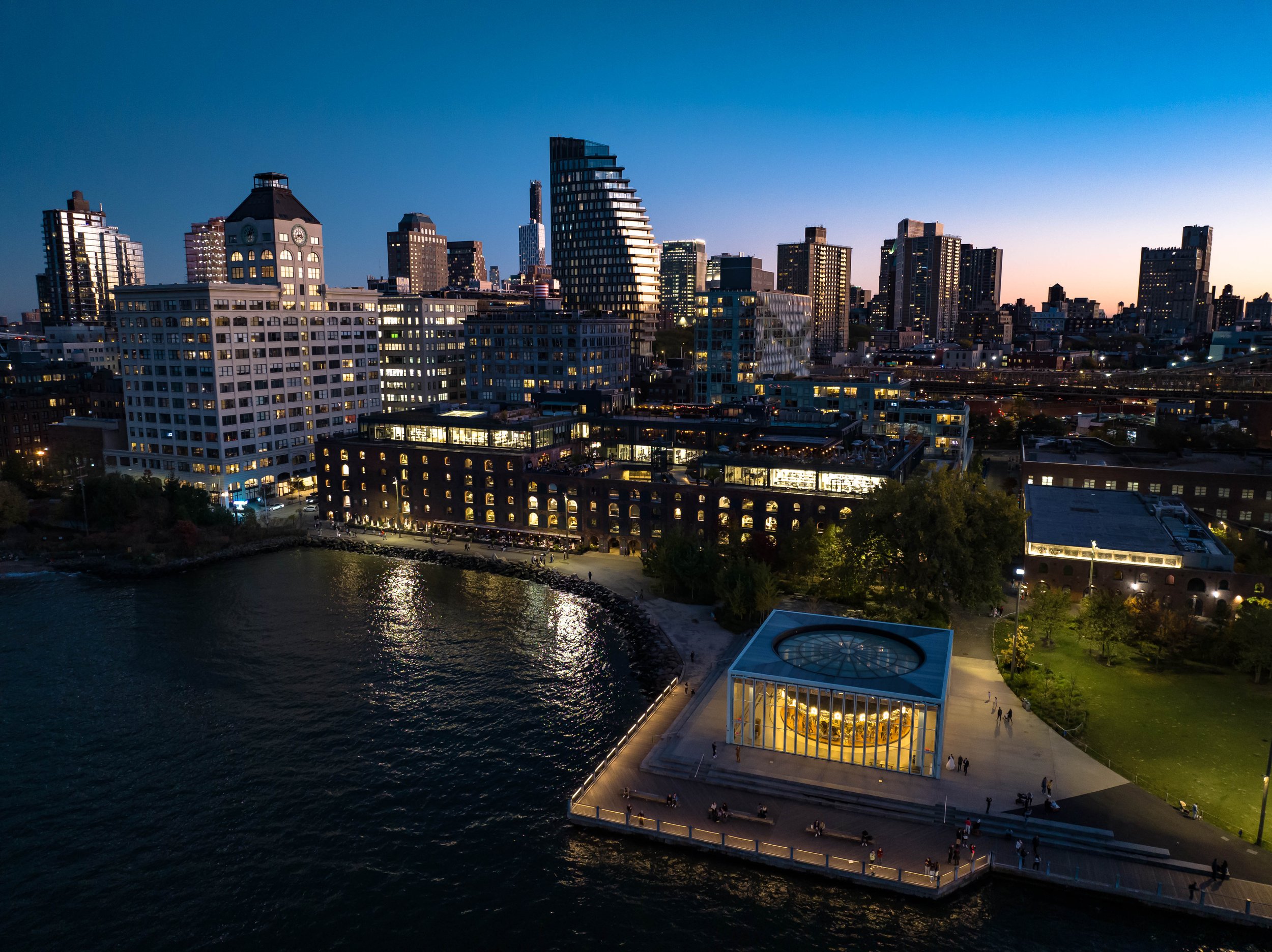 Carousel in Brooklyn Bridge Park with Downtown Brooklyn in the background.