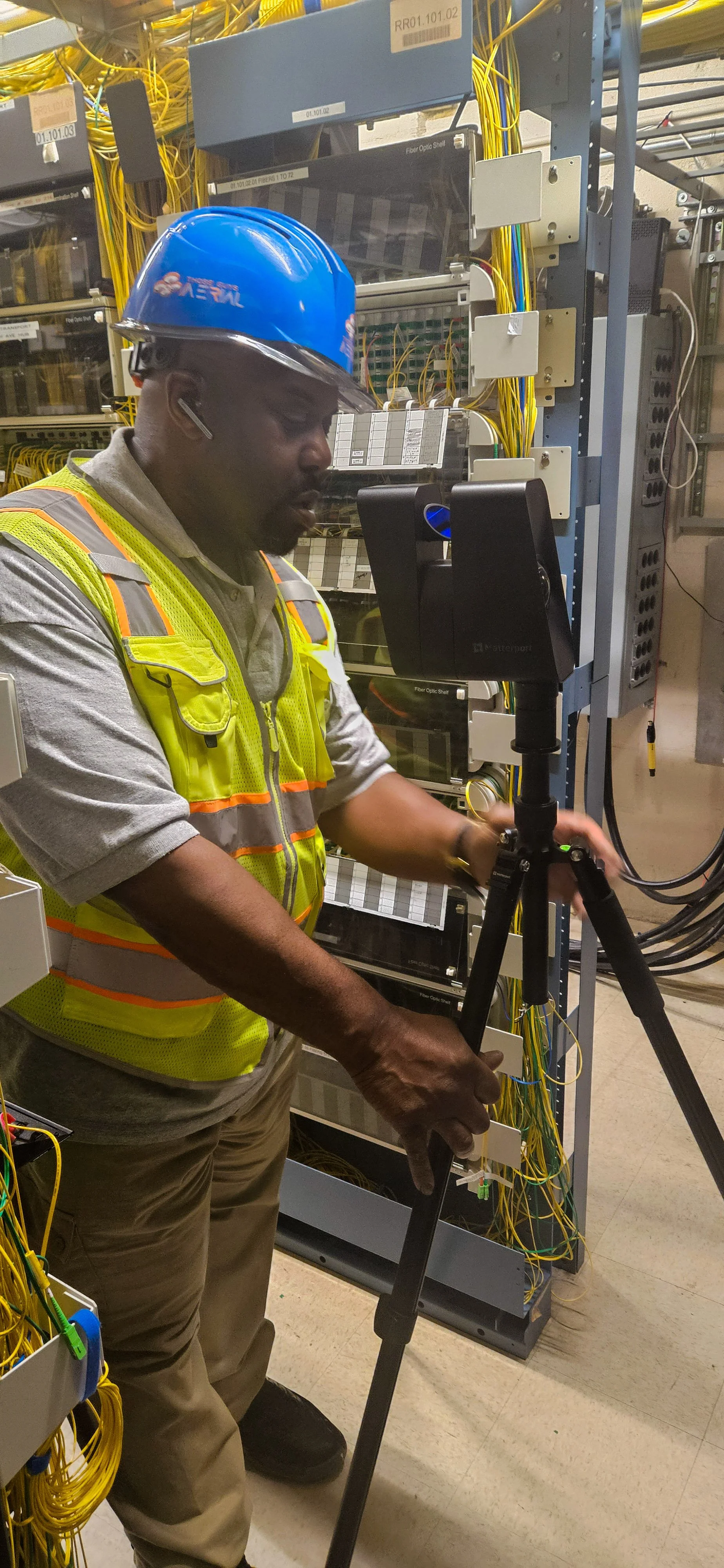 Lawrence from Those Guys Aerial is using a Matterport Pro to do a ground scan.