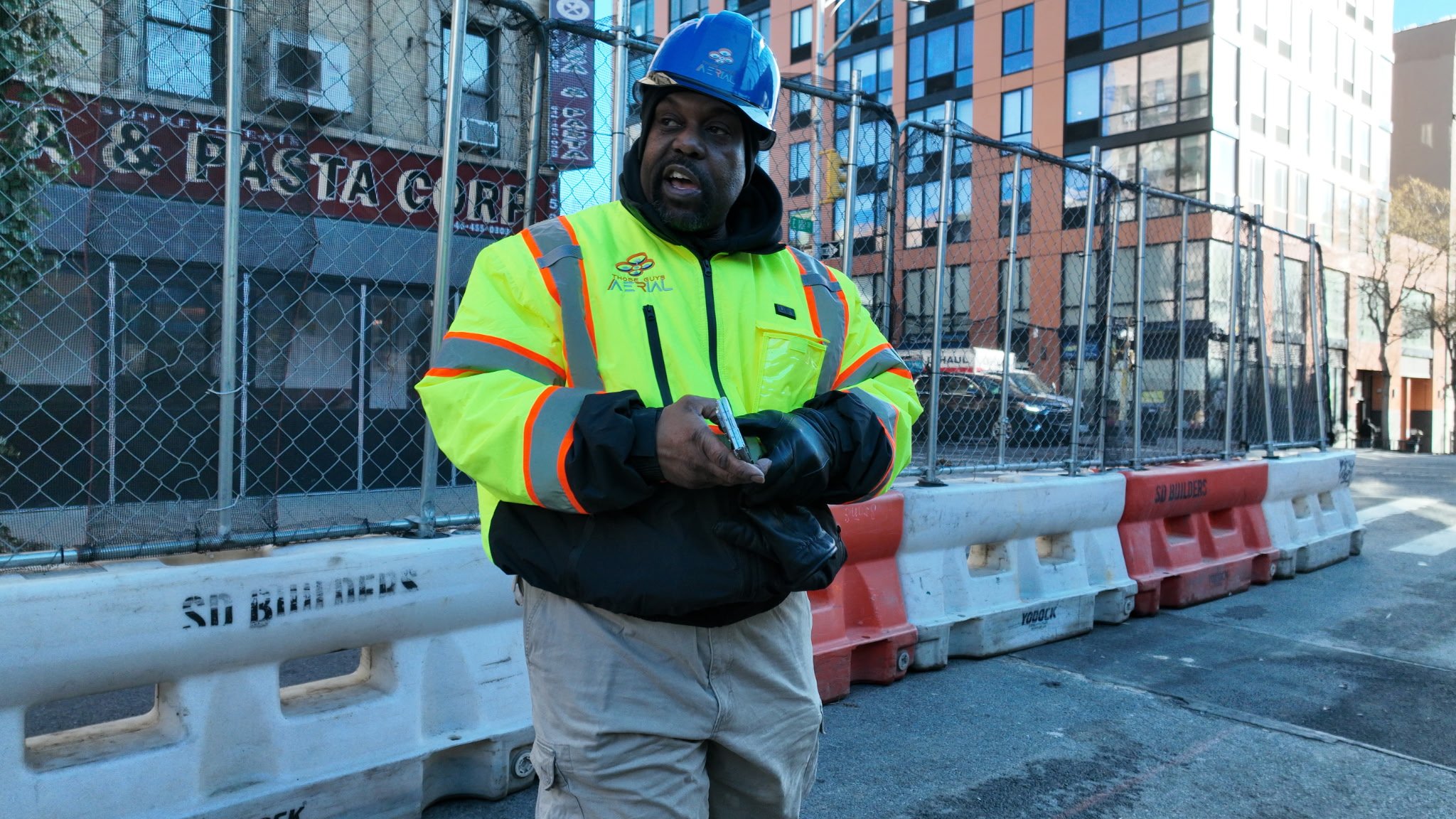 Herman from Those Guys Aerial on the job in East Harlem