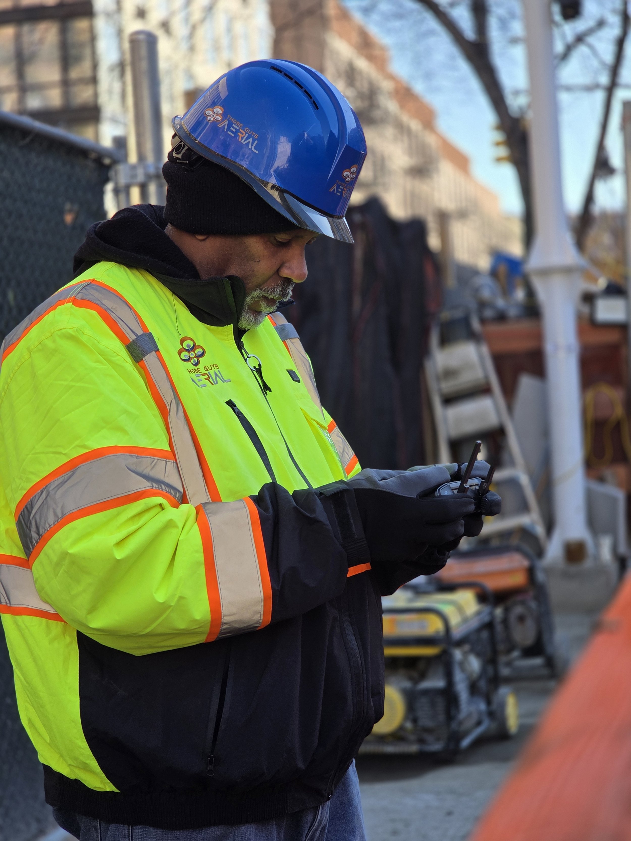 Lawrence from Those Guys Aerial on a jobsite.