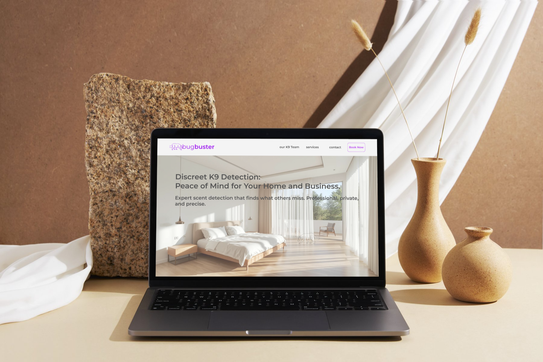 Website design for a K9 bed bug detection service, shown on a laptop
