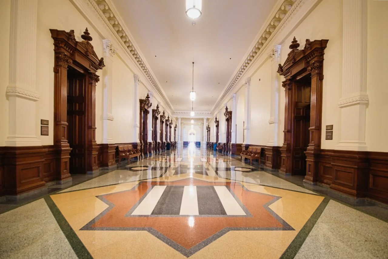 Interior corridor of the Texas State Capitol with terrazzo floor