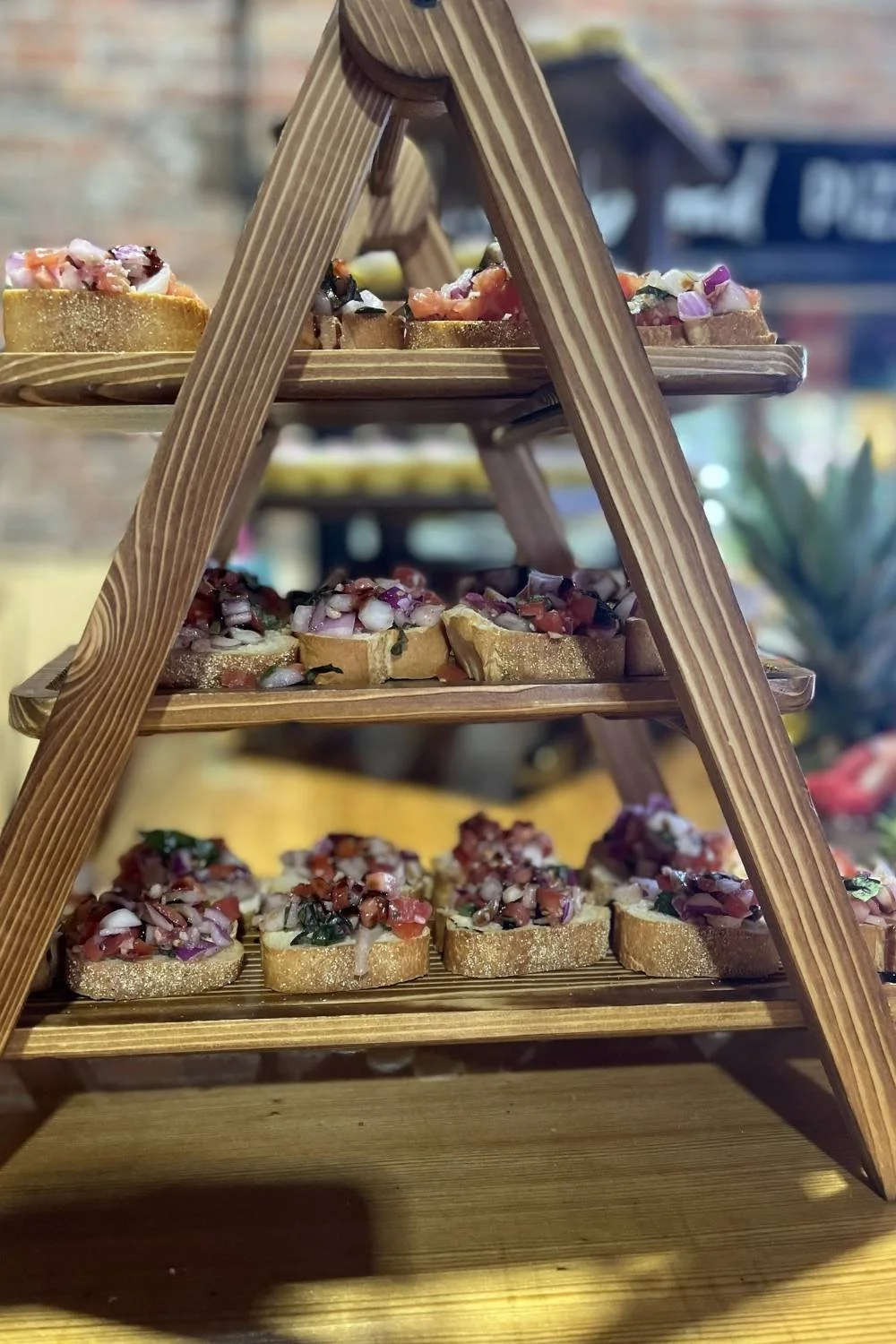 Tiered appetizer display prepared for a catered event.