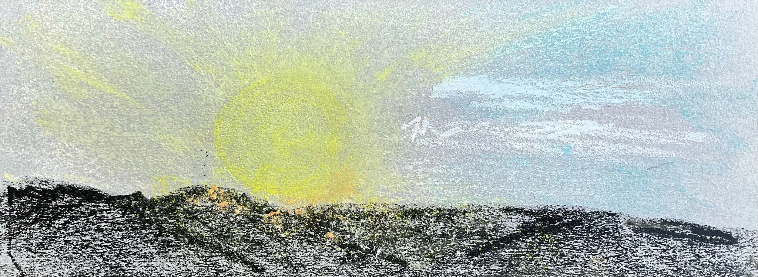 Child's drawing of a yellow sun above black hills with a blue sky.