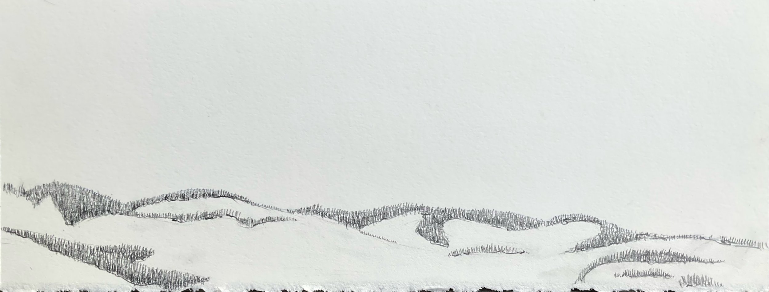 Black and white sketch of mountain peaks over a landscape.