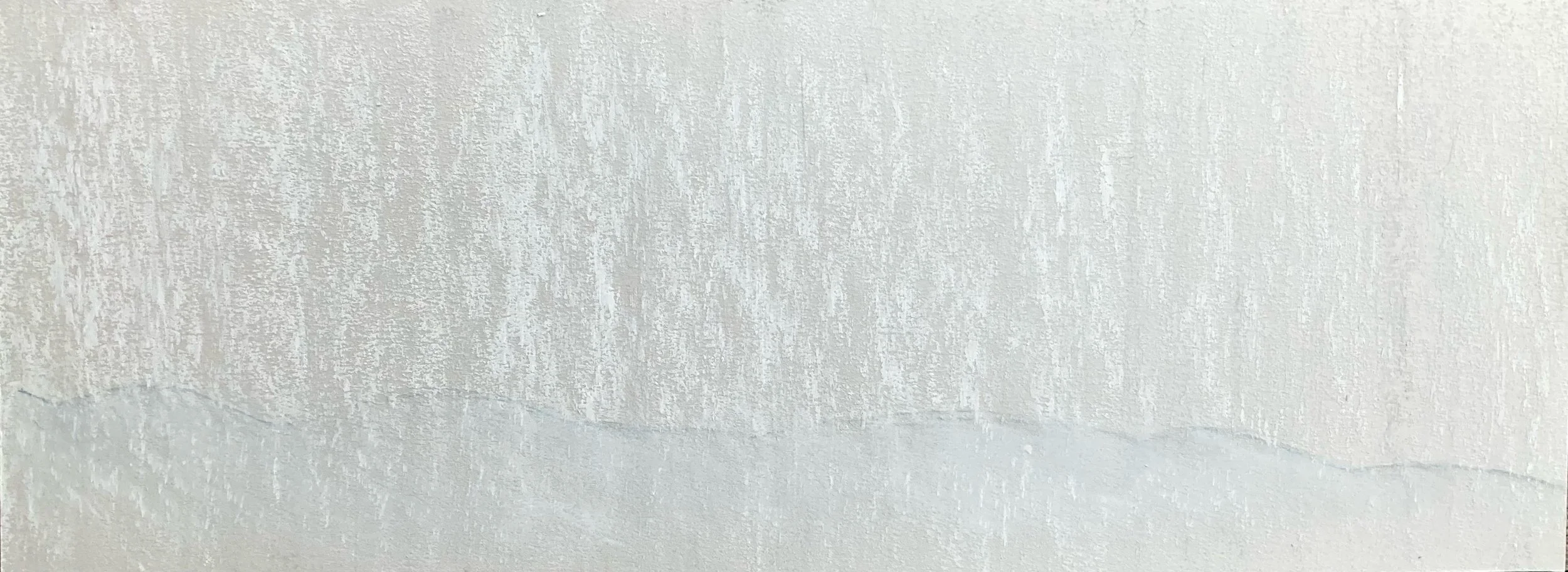 Close-up of a textured white wall with a faint crack.