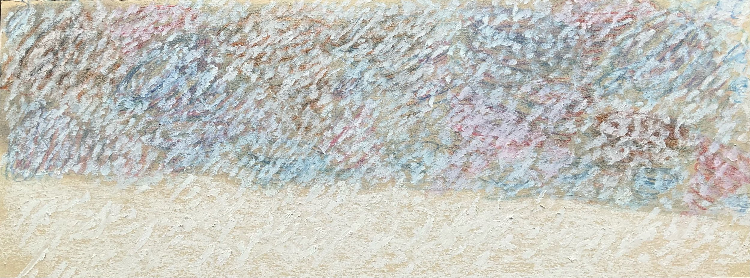 Close-up of a textured wall with a horizontal strip of colorful, swirling pastel paints or chalks.