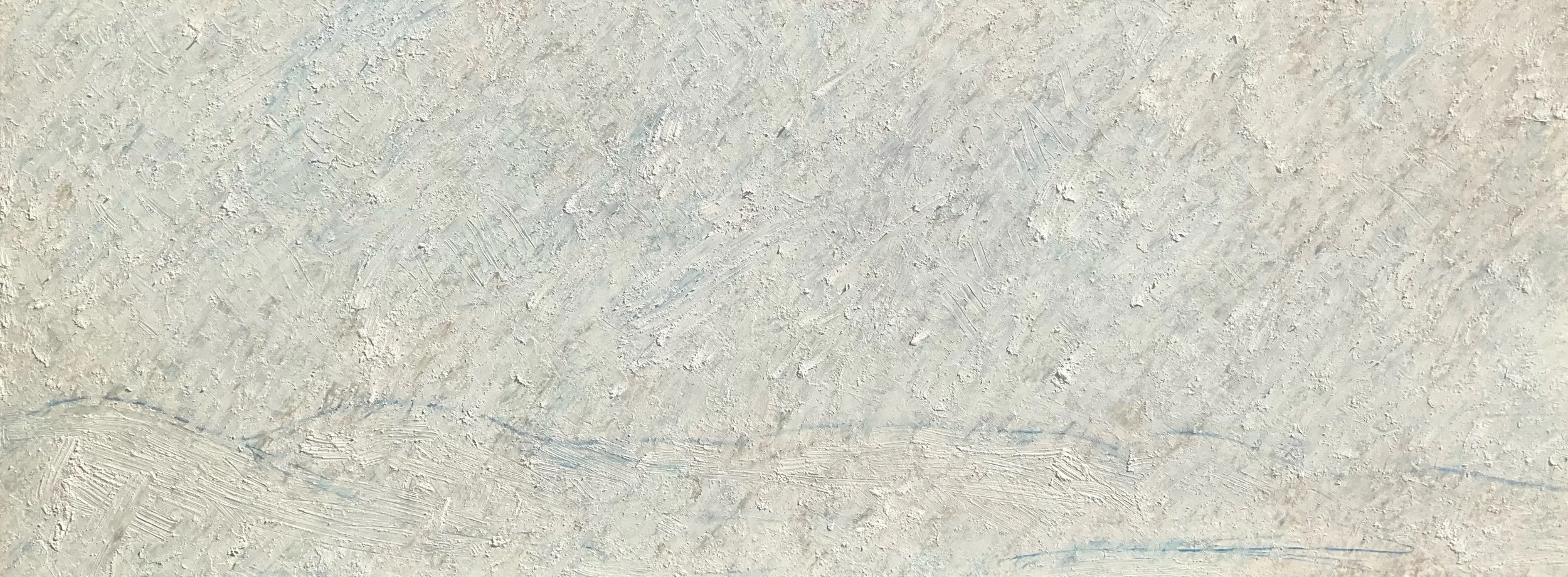 Close-up of a textured white wall or ceiling with visible brush strokes and plastered surface.