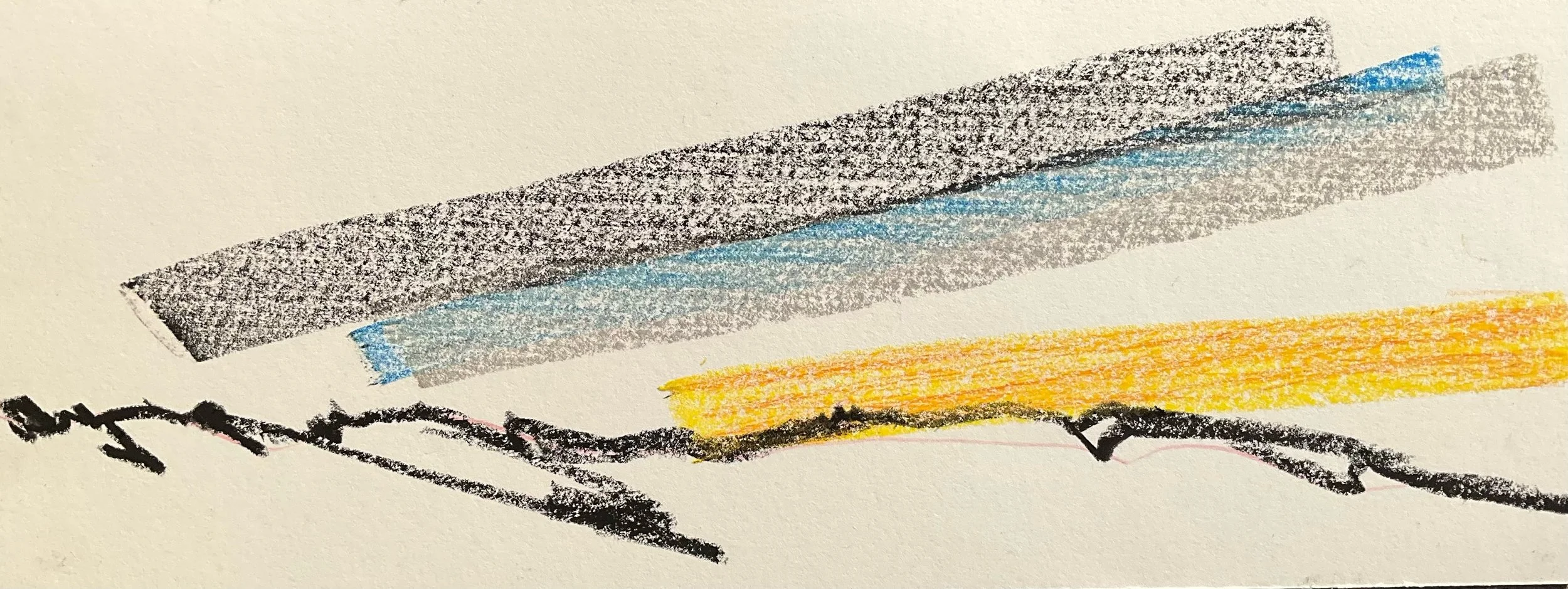 Abstract drawing with black, blue, gray, and yellow streaks on white paper.