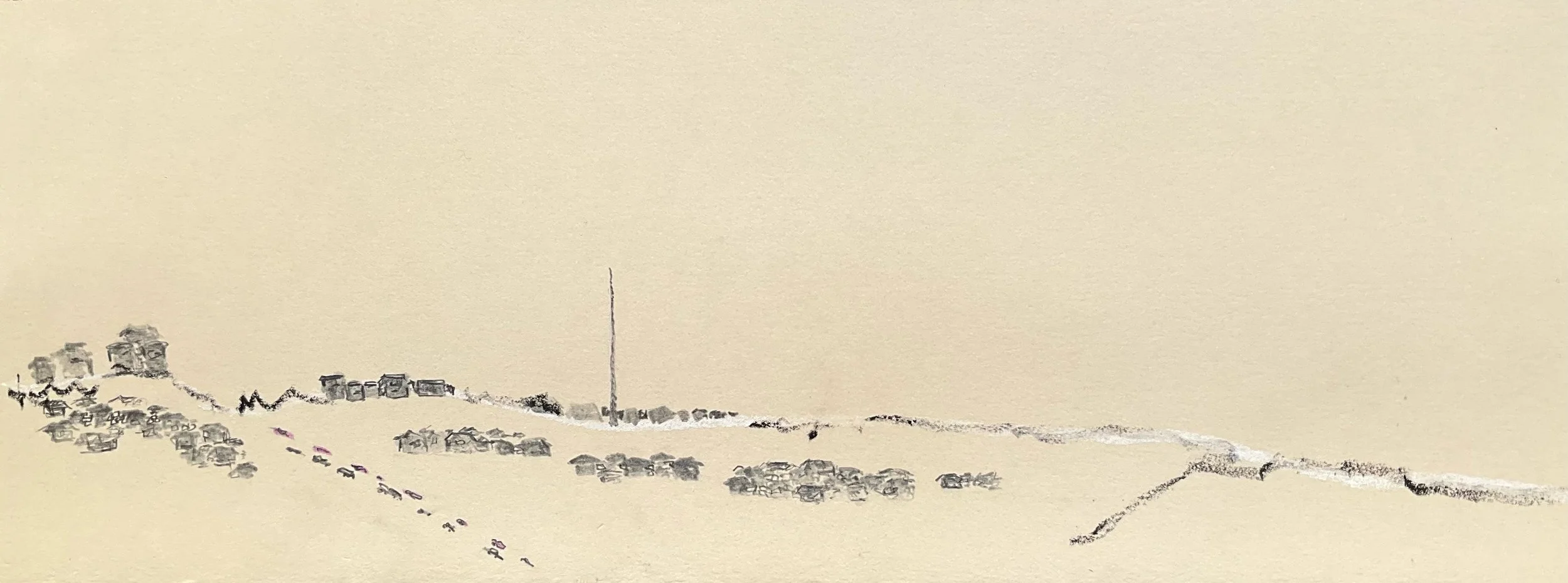 A desert landscape with small, simple houses scattered across sand dunes, with a tall flagpole in the background.